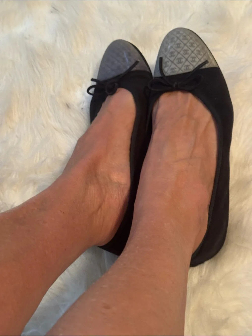 CHANEL Black Ballet Flats with Silver Logo Cap
